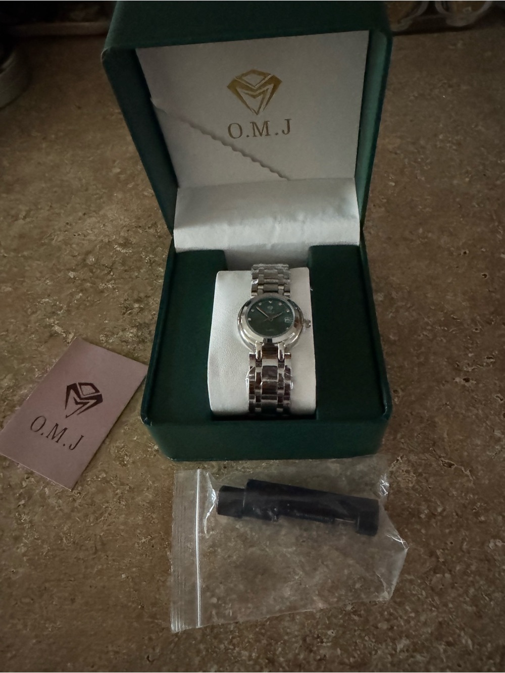 O.M.J women’s Watch Mother of Pearl Dial Stainless Steel Band Water Resistant